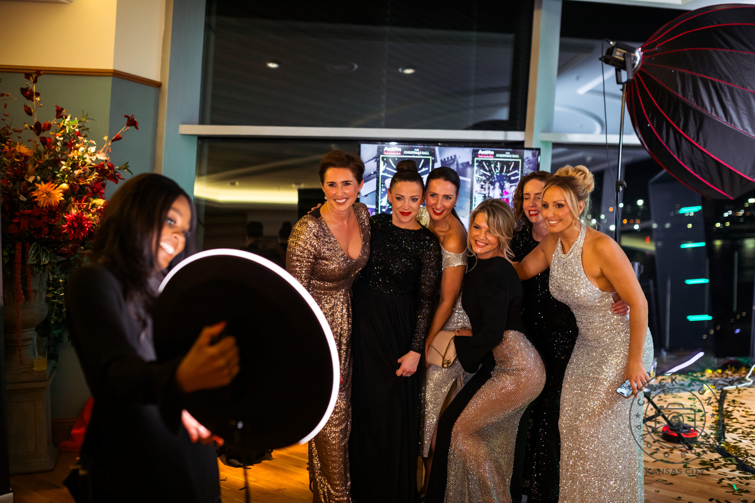Group of people posing together at a corporate event