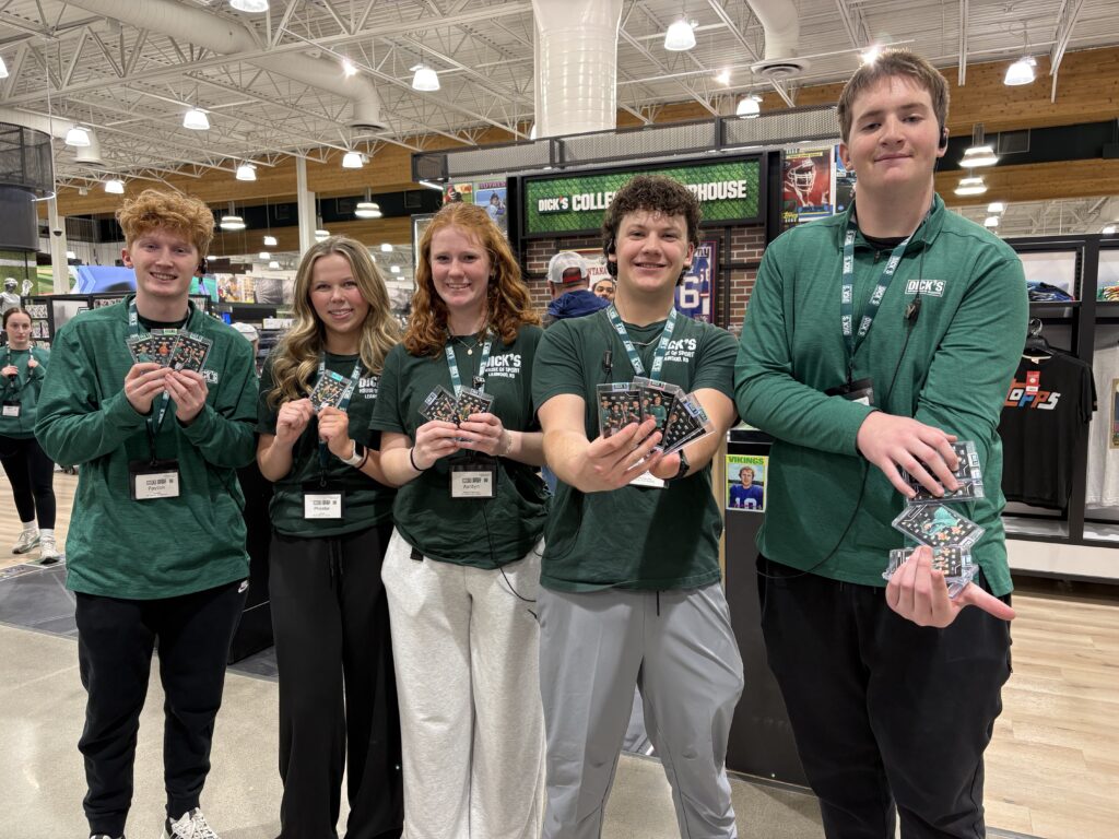 Group of people posing together at an event