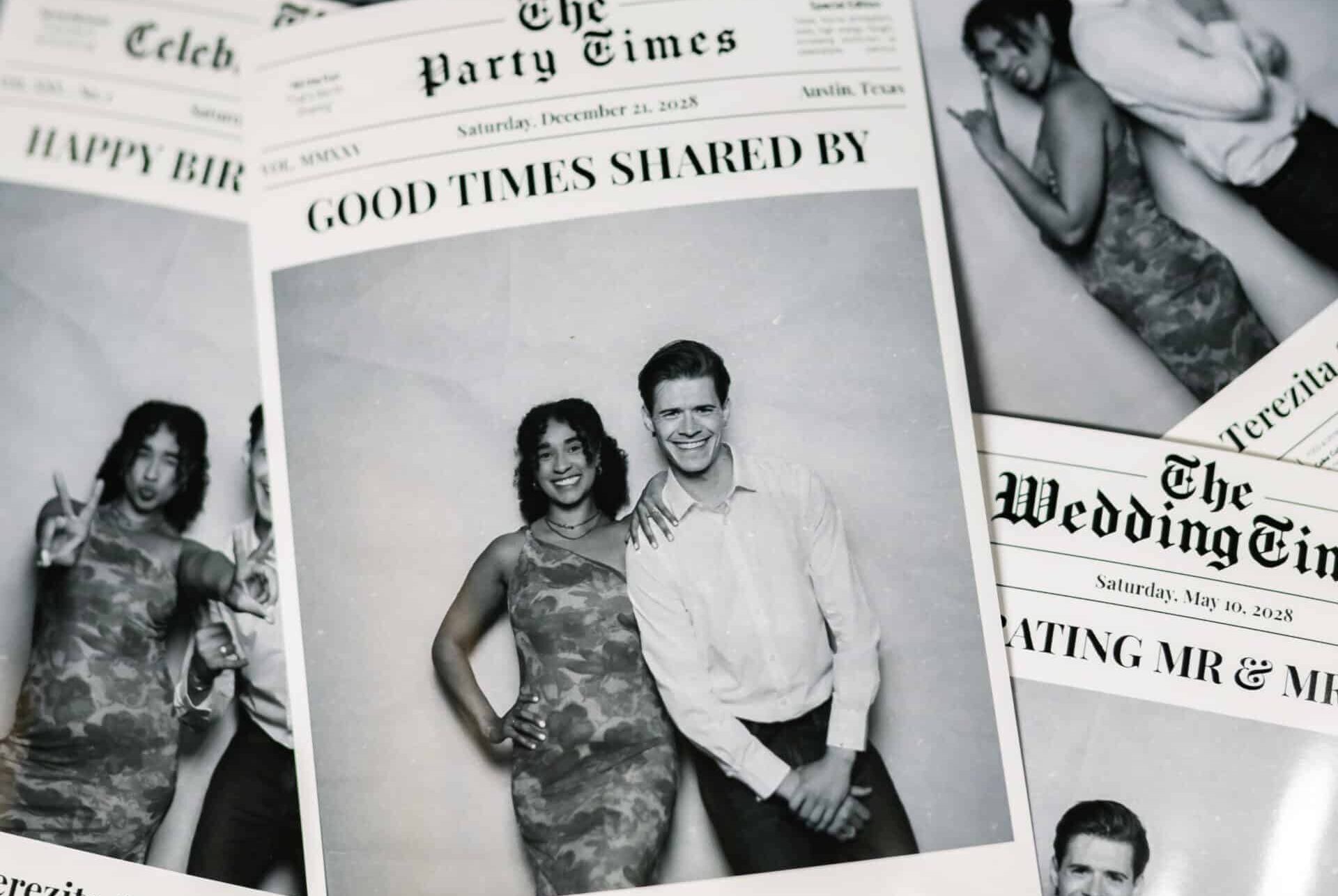 Black and white photo booth print of two people posing together at a corporate event