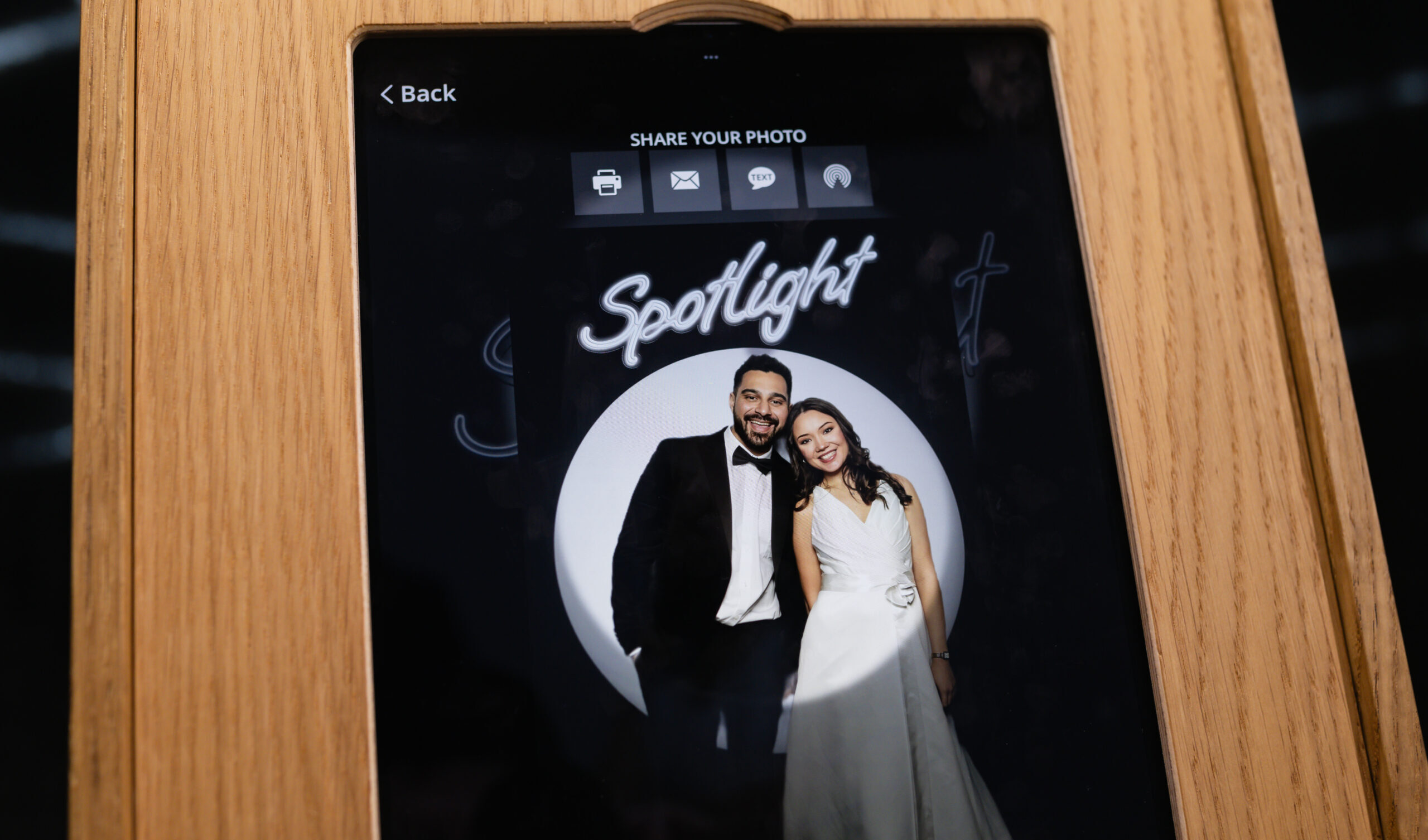 Silhouette wedding photo booth print of a couple embracing