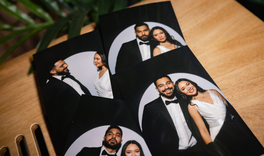 Close-up of two people posing together at a formal event