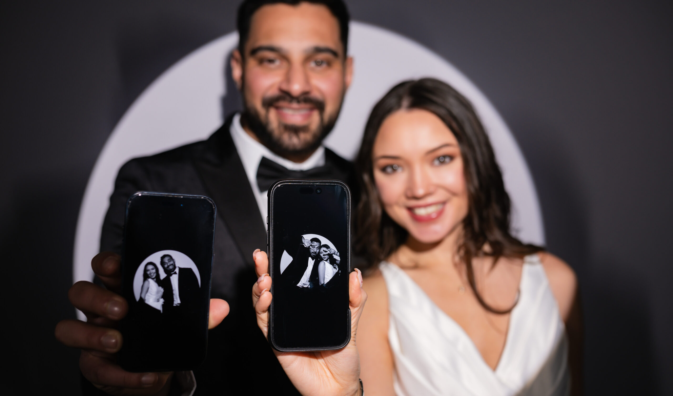 Man and woman posing together, smiling