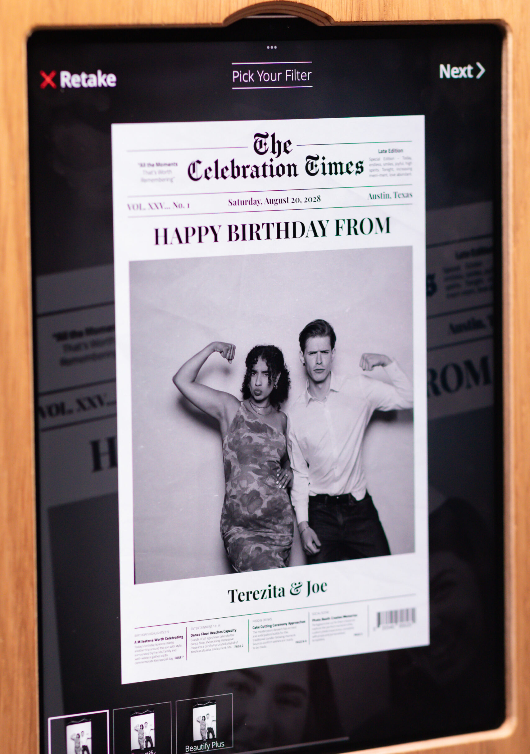 Newspaper-style printed photo booth card on a table