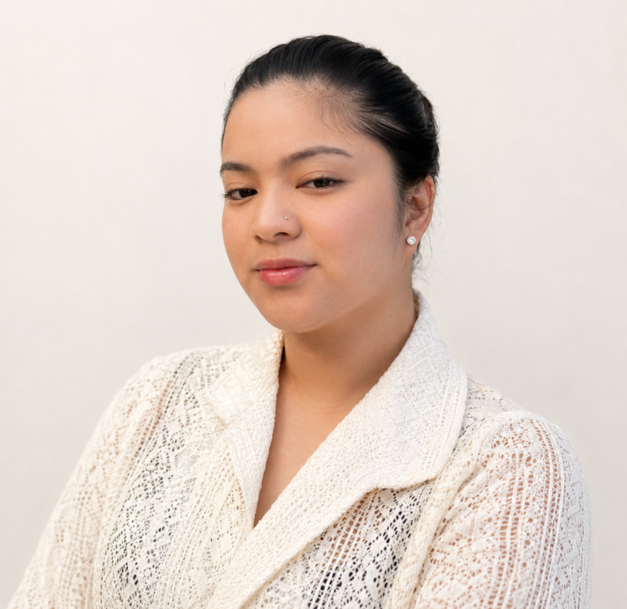 Woman smiling, labeled "Grace Lambu - Marketing and Design